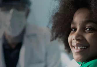 Banner Unimed Odonto Essencial Exclusivo Menina sorrindo no dentista